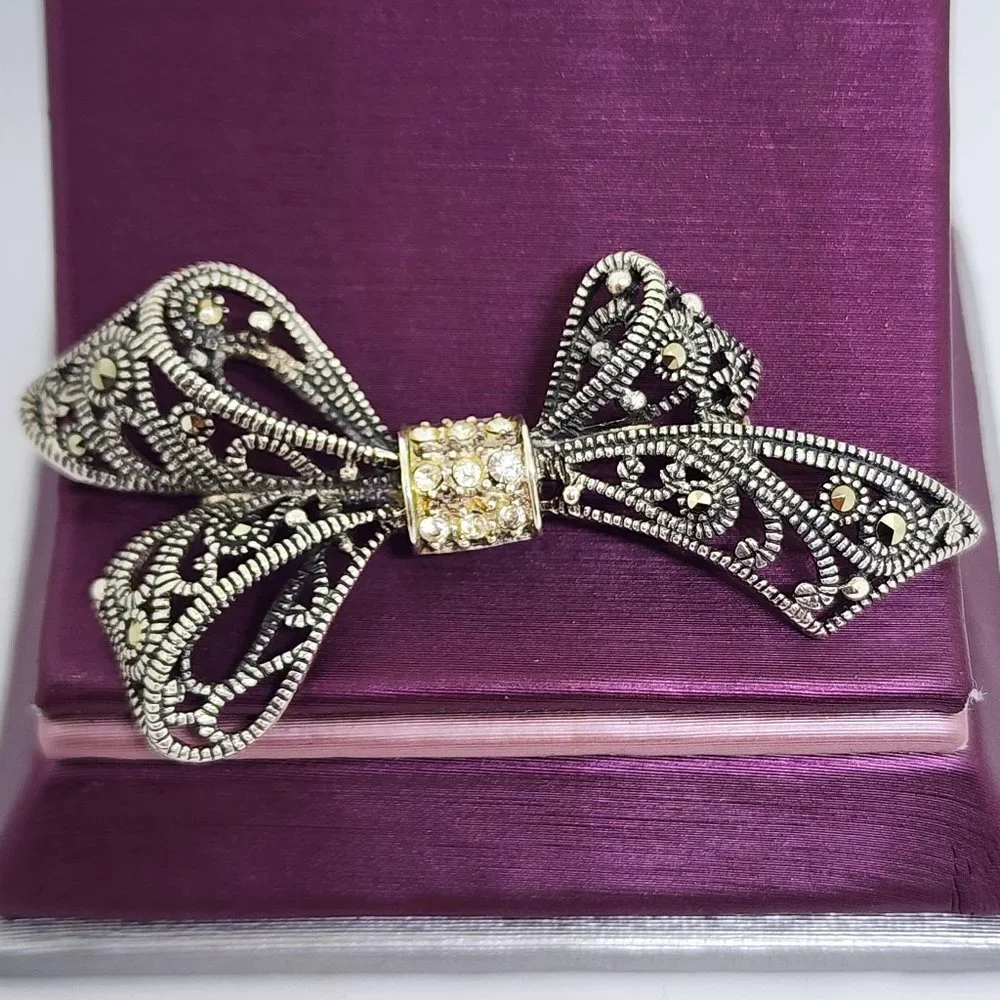 Vintage Sterling Silver Rhinestone and Marcasite Accent Bow Pin Brooch